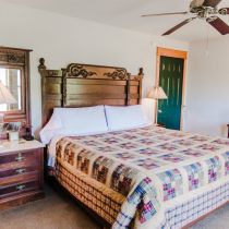 Room 6 Bed and Night Stand Looking Toward Entry